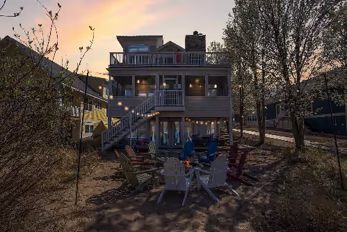 Terrace/patio at Lakefront w/ your own sandy beach! Sleeps 17. Family friendly! NO PETS